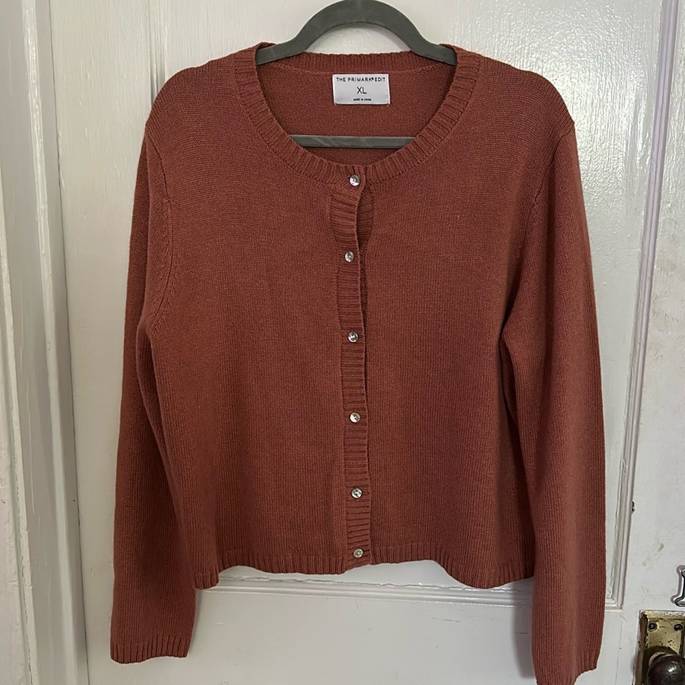 The Primark Edit Mauve Button Up Sweater with Opalesk Buttons.